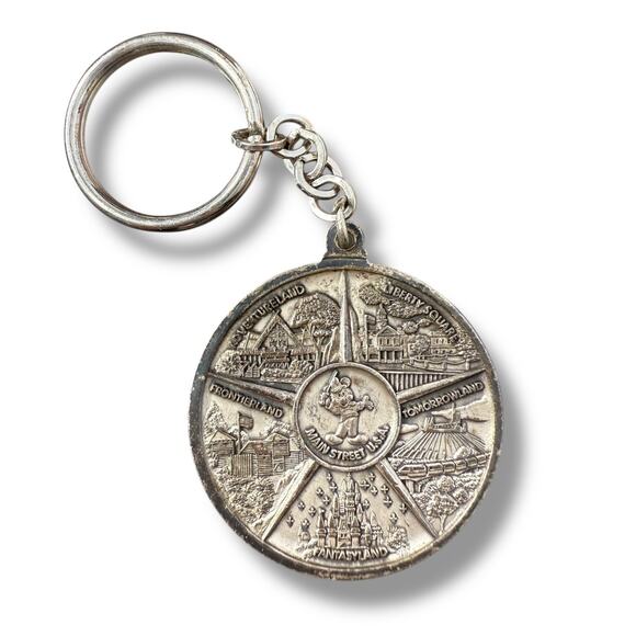Disney Accessories - Walt Disney World Magic Kingdom Lands Coin Medallion Keychain Silver VTG
